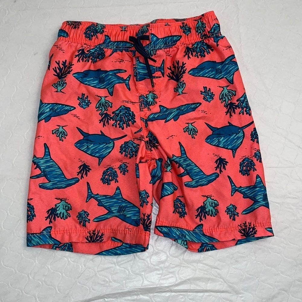 Old Navy coral and teal shark print lined swim trunks